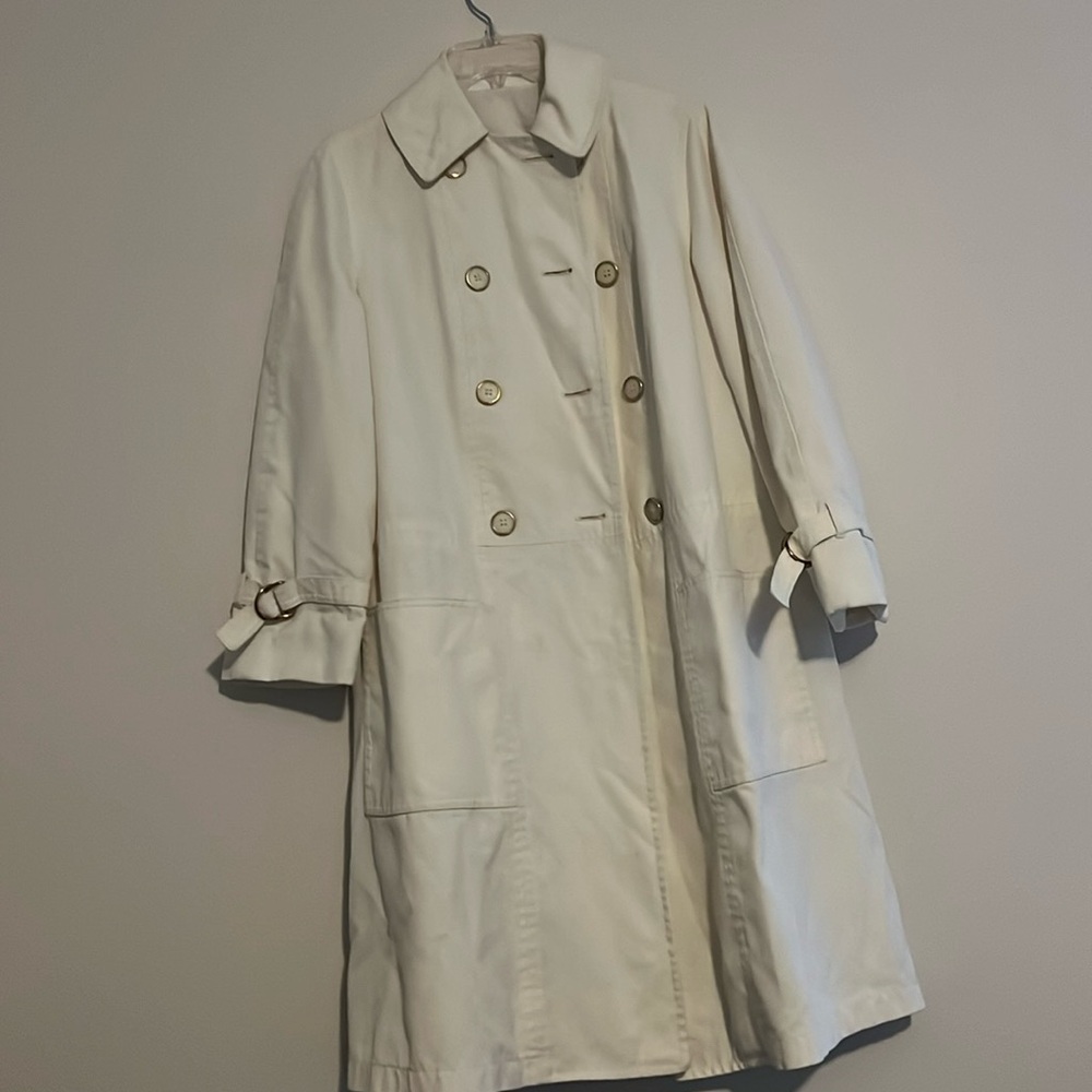 This size 8 trench coat is in good condition.